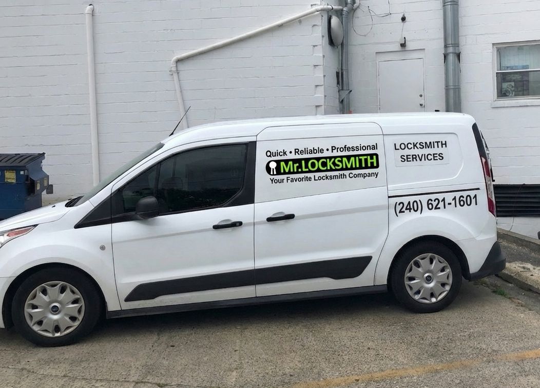 Mr. Locksmith service van with company logo and phone number
